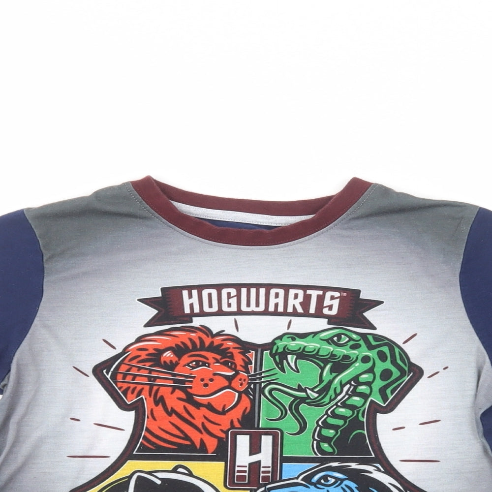 Close-up detail of Character.Com girls’ blue polyester pullover t-shirt, size 8-9, years crew neck pullover - hogwarts
