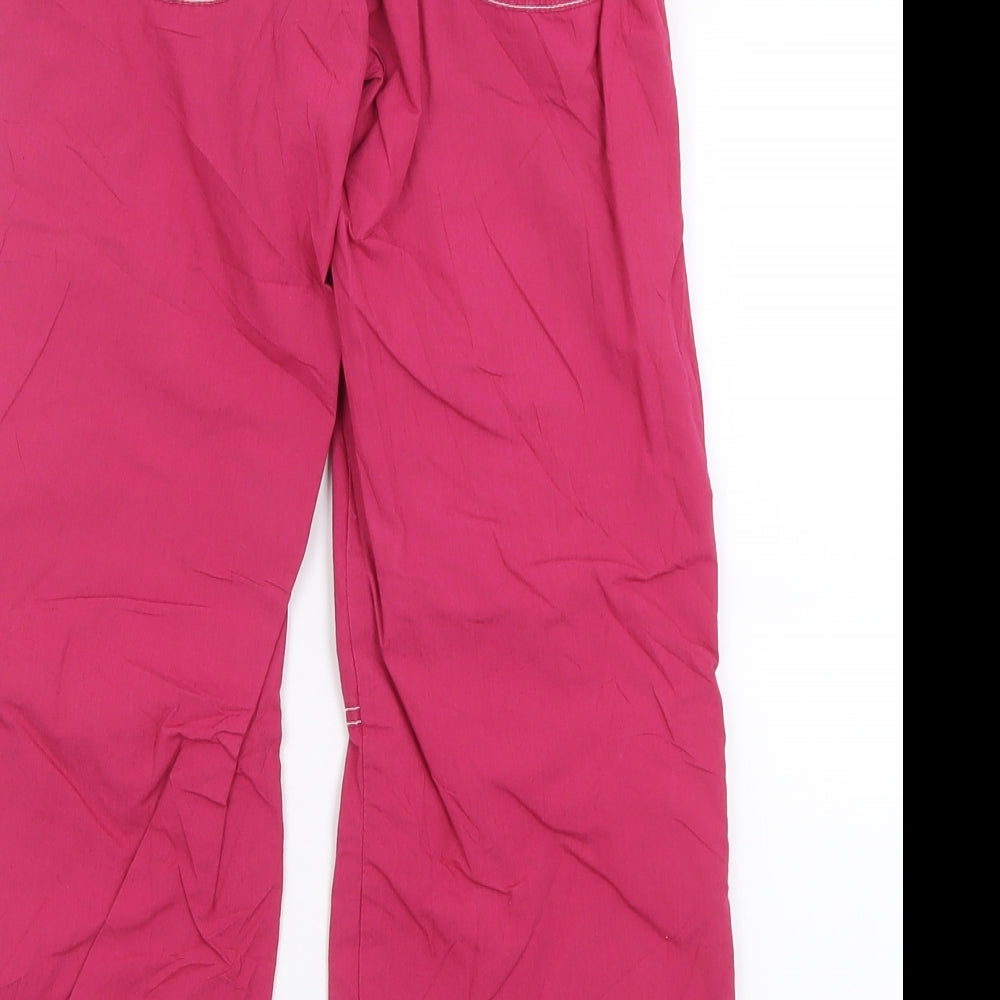 Brand and care label for Next girls’ pink cotton capri trousers, size 9, months regular hook & loop
