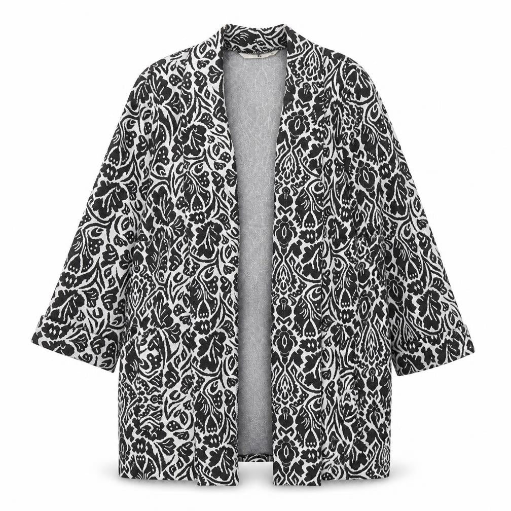 Front view of Tu women’s black v-neck floral polyester cardigan jumper, size UK 14