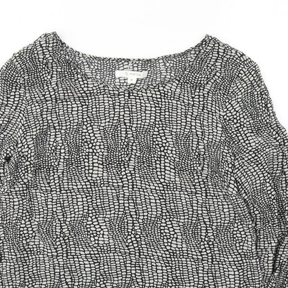 Close-up detail of St Martins women’s black geometric viscose basic blouse, size UK 10, round neck