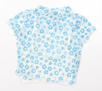 Back view of Primark girls’ blue floral polyester basic t-shirt, size 8-9, years crew neck pullover