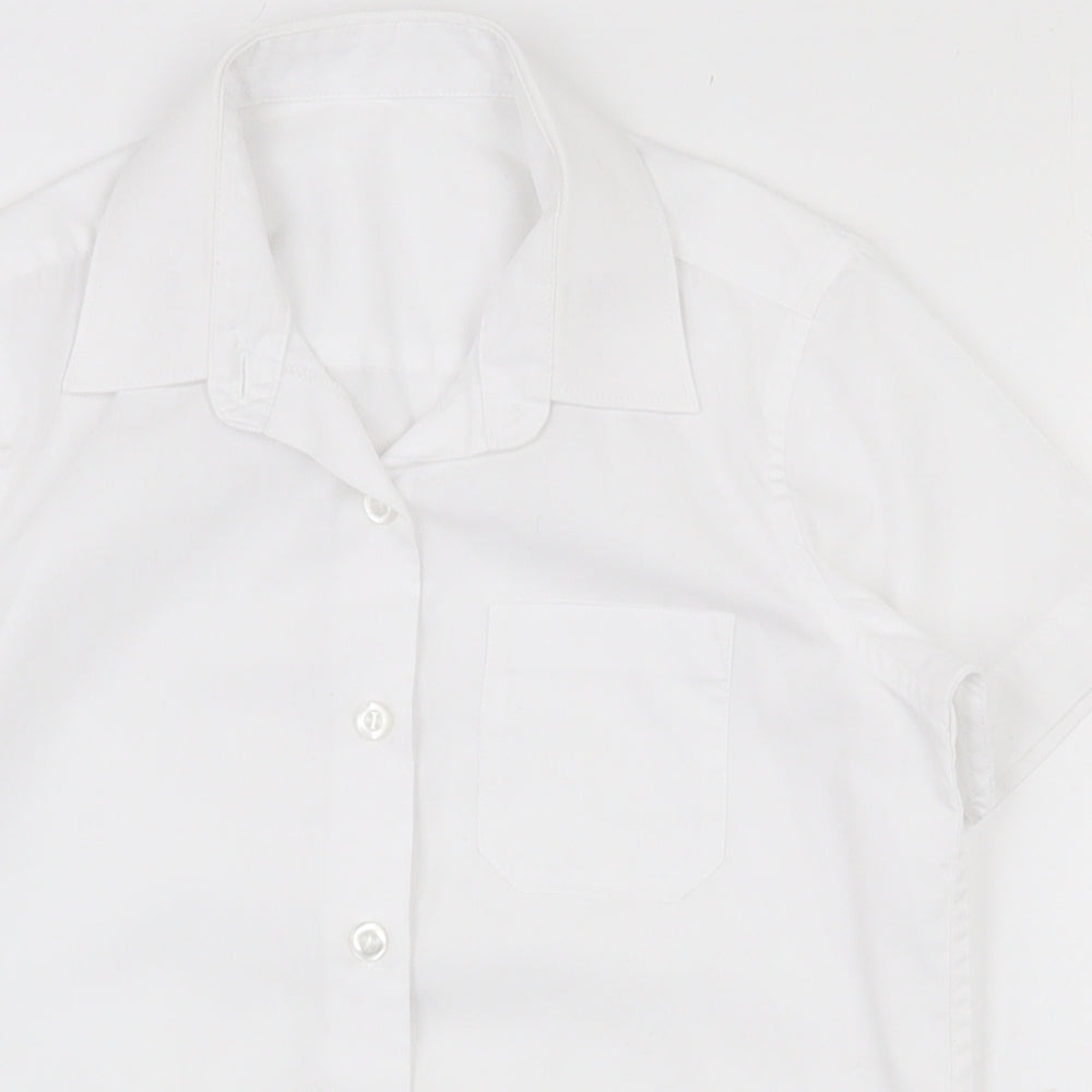 Close-up detail of Dunnes girls’ white polyester basic button-up, size 5-6, years collared button - school wear