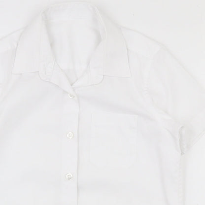 Close-up detail of Dunnes girls’ white polyester basic button-up, size 5-6, years collared button - school wear