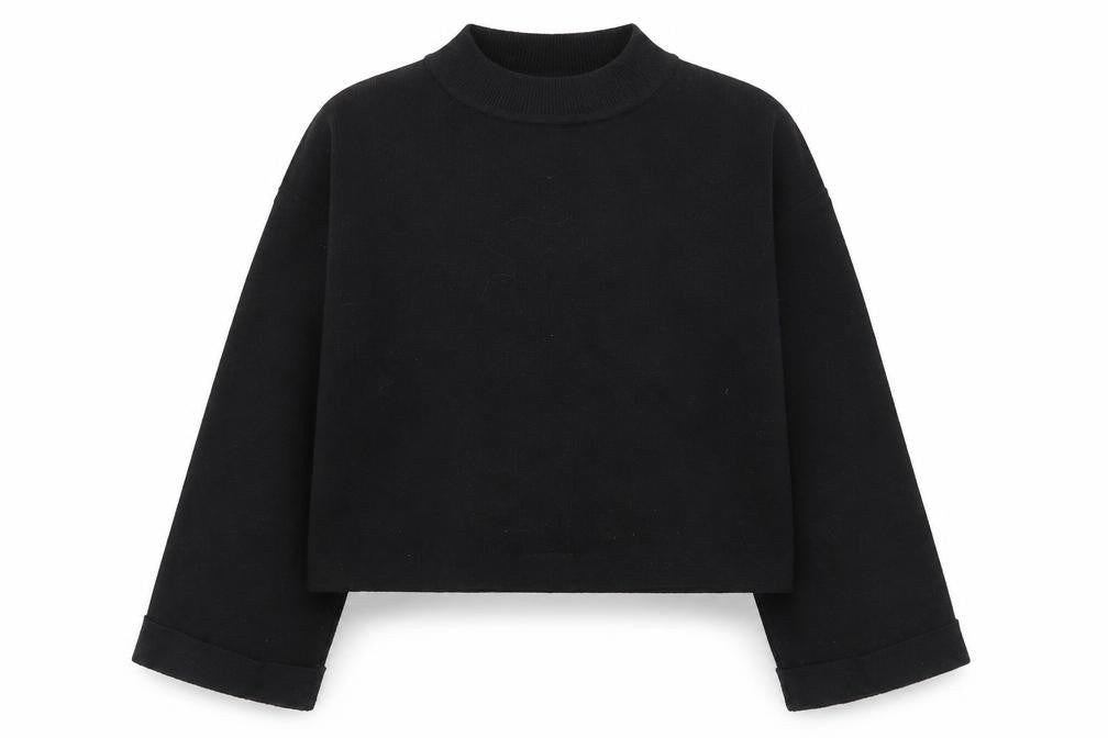 Front view of Zara girls’ black high neck polyester jumper, size 11-12, years magnetic
