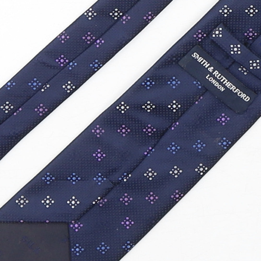 Brand and care label for Smith & Rutherford men’s multicoloured geometric silk pointed tie one size