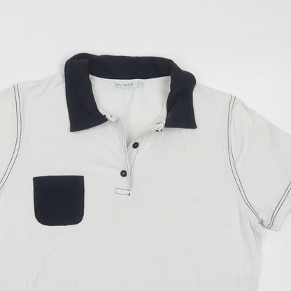 Close-up detail of One Up Golf women’s white cotton basic polo, size L, collared