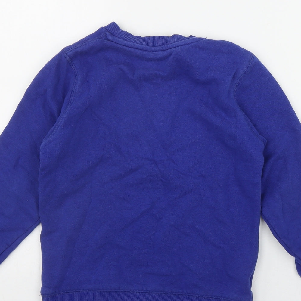 Brand and care label for Tu boys’ blue cotton pullover sweatshirt, size 7, years pullover