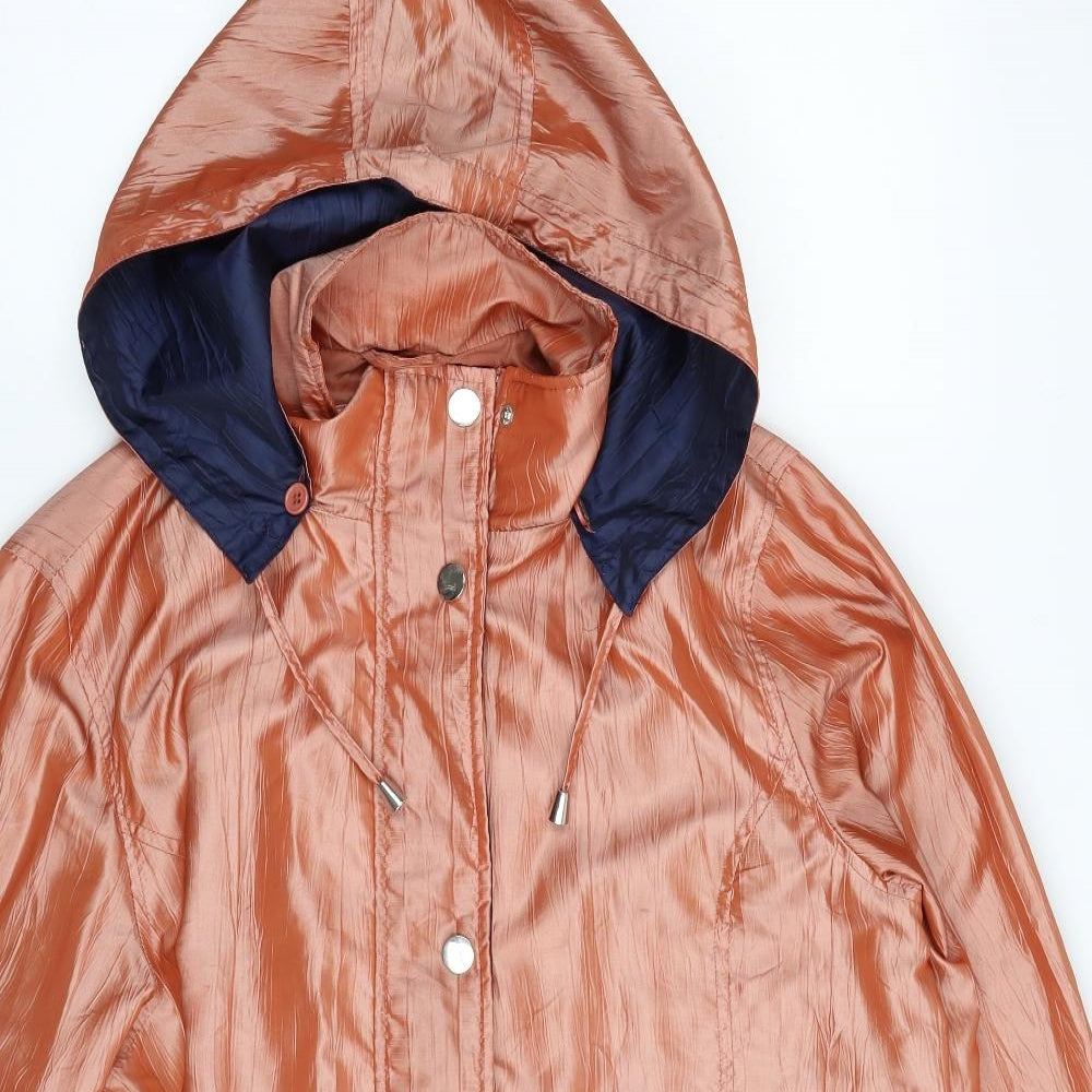 Close-up detail of J B C Collection women’s orange jacket, size UK 18, zip