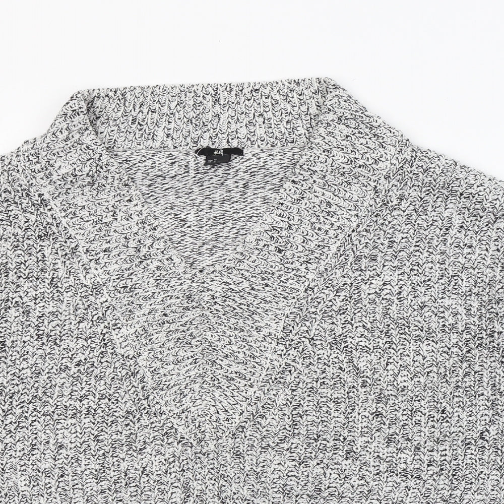 Close-up detail of H&M women’s white v-neck cotton jumper, size M, - side slits
