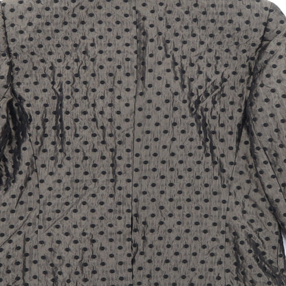 Brand and care label for TUZZI women’s brown polka dot acrylic jacket blazer, size UK 14