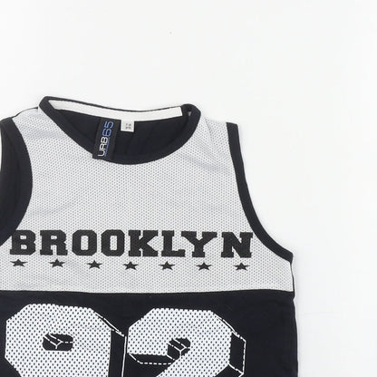 Close-up detail of URB boys’ black cotton basic tank, size 7-8, years scoop neck pullover