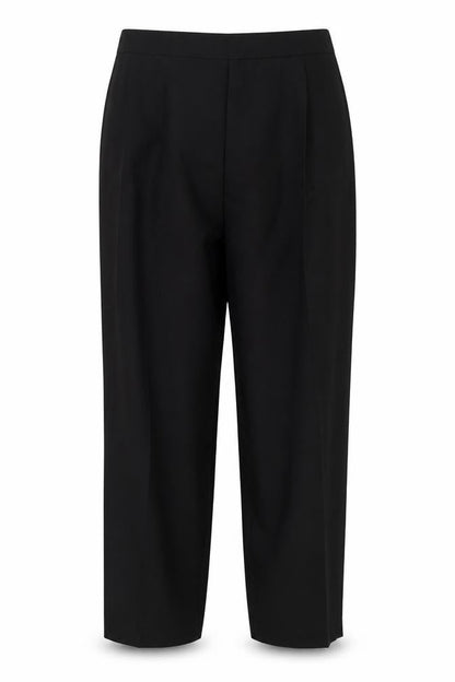 Front view of Preworn women’s black polyester trousers, size UK 30, in, 25-inch leg regular