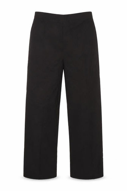 Front view of Preworn women’s black polyester trousers, size UK 16, 29-inch leg regular