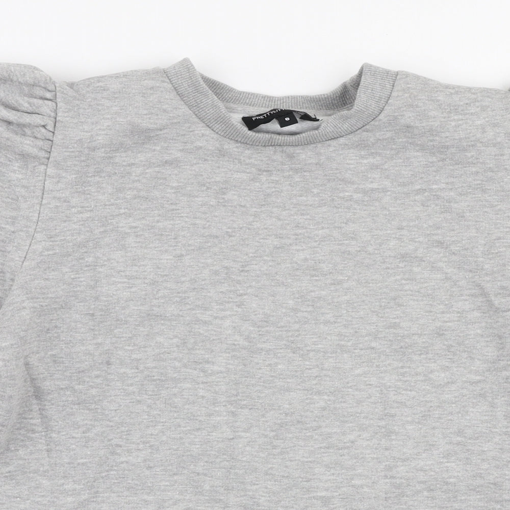 Close-up detail of PRETTYLITTLETHING women’s grey polyester pullover sweatshirt, size UK 8, pullover