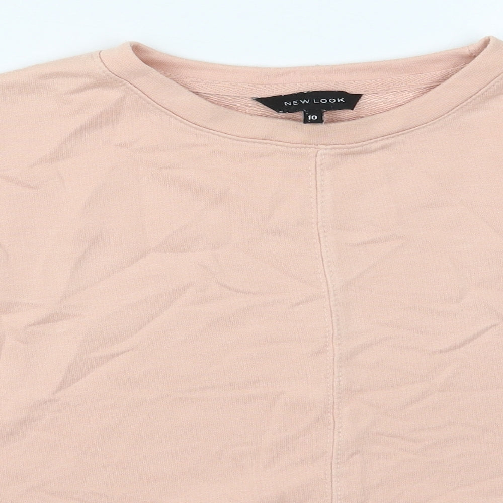 Close-up detail of New Look women’s pink cotton pullover sweatshirt, size UK 10, pullover