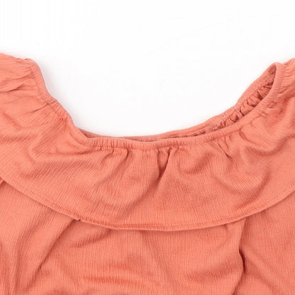 Close-up detail of Primark girls’ orange polyester basic blouse, size 9-10, years round neck pullover - knot detail