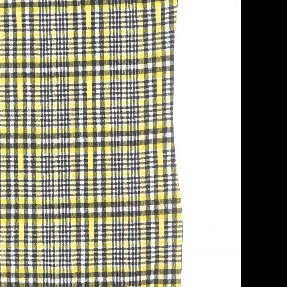 Brand and care label for SHEIN girls’ yellow plaid polyester mini, size 12, years square neck pullover