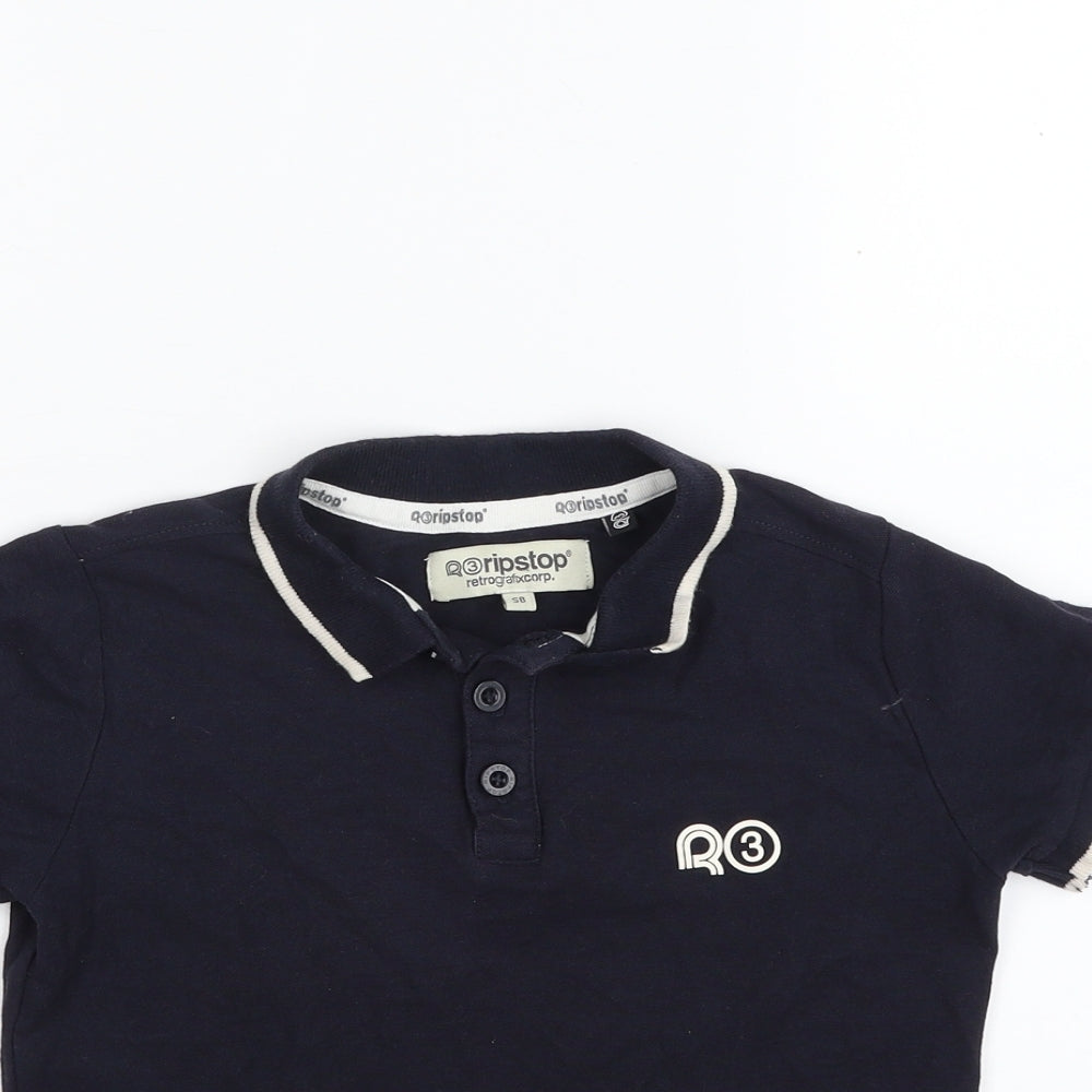 Close-up detail of Ripstop boys’ blue 100% cotton basic polo, size S, collared button