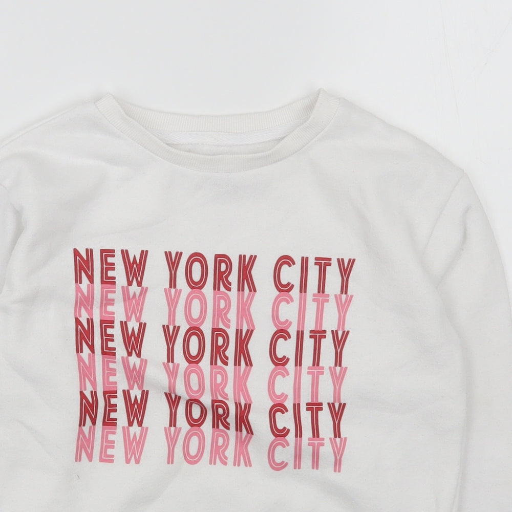 Close-up detail of Primark girls’ white cotton pullover sweatshirt, size 9-10, years pullover