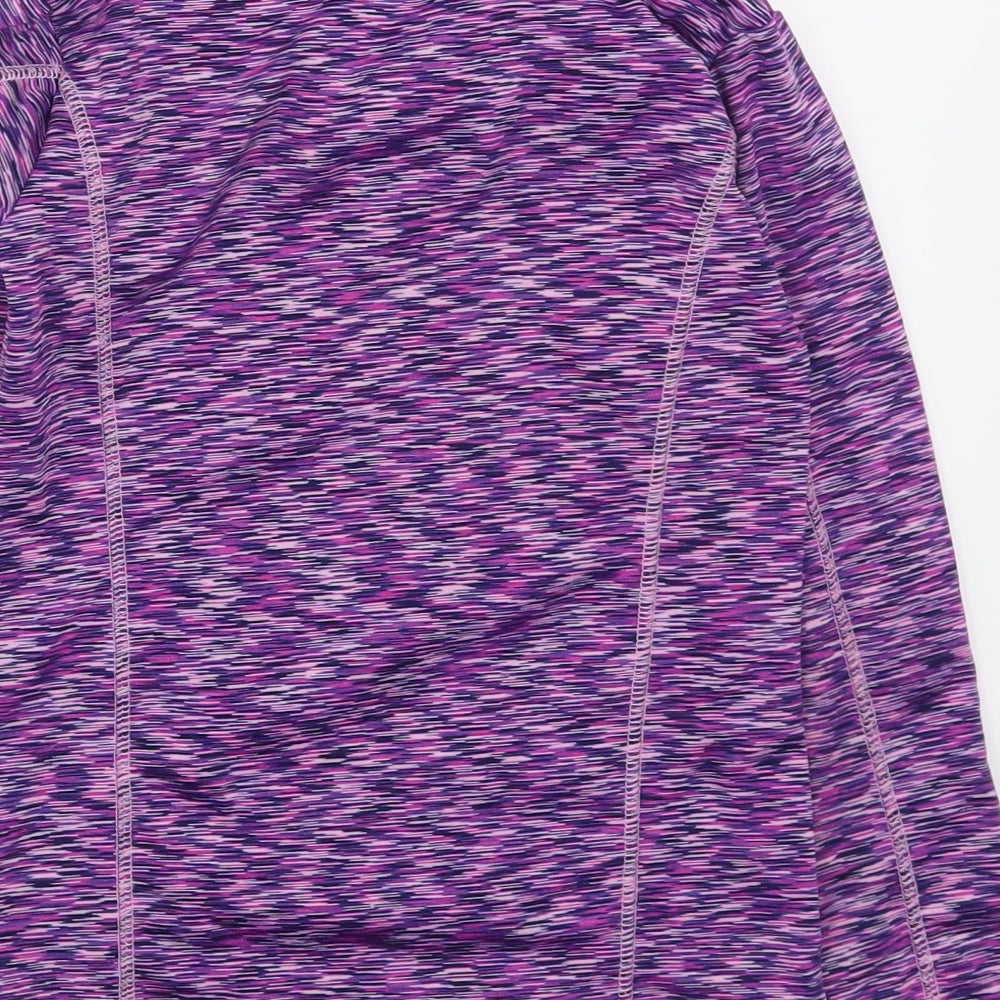 Brand and care label for Crivit girls’ purple jacket, size 7-8, years zip