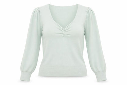 Front view of Dunnes women’s green v-neck polyester jumper, size XS