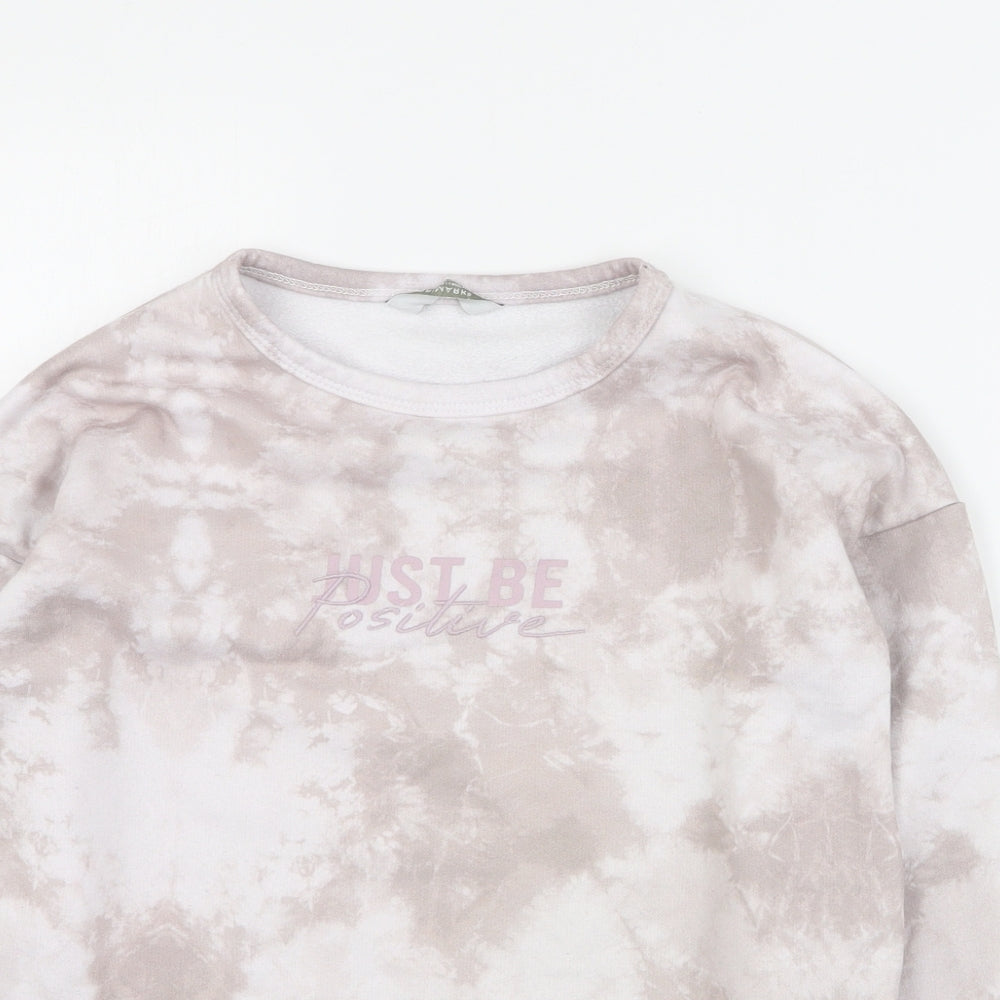 Close-up detail of Primark girls’ pink polyester pullover sweatshirt, size 9-10, years pullover - slogan
