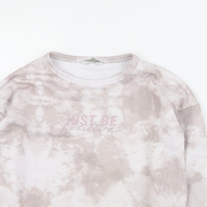 Close-up detail of Primark girls’ pink polyester pullover sweatshirt, size 9-10, years pullover - slogan