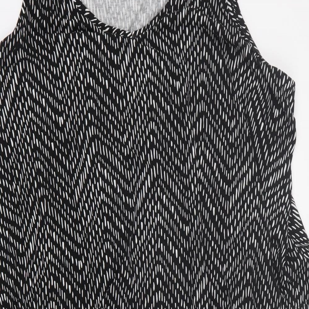 Close-up detail of Target women’s black geometric viscose a-line, size XL, v-neck pullover