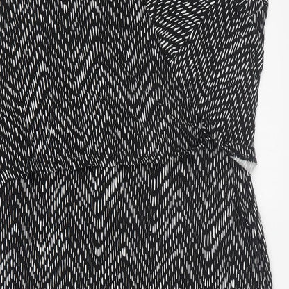 Brand and care label for Target women’s black geometric viscose a-line, size XL, v-neck pullover