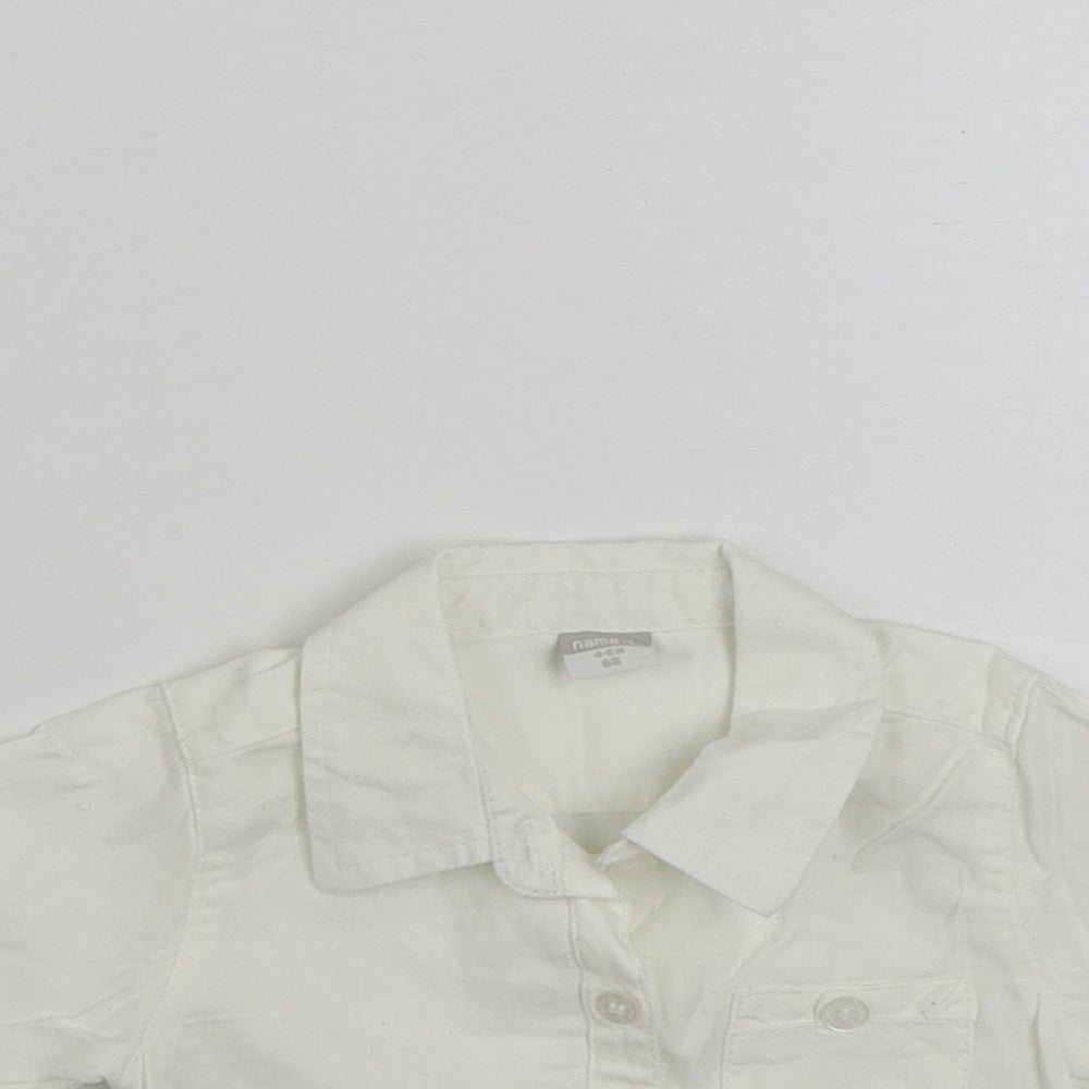 Close-up detail of NAME IT girls’ white 100% cotton basic button-up, size 3-6, months collared button -, size 4-6, months