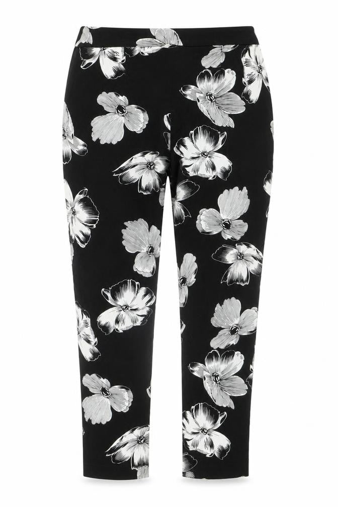 Front view of F&F women’s black floral cotton jegging jeans, size UK 32, in, 26-inch leg regular zip