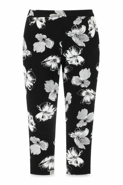 Front view of F&F women’s black floral cotton jegging jeans, size UK 32, in, 26-inch leg regular zip