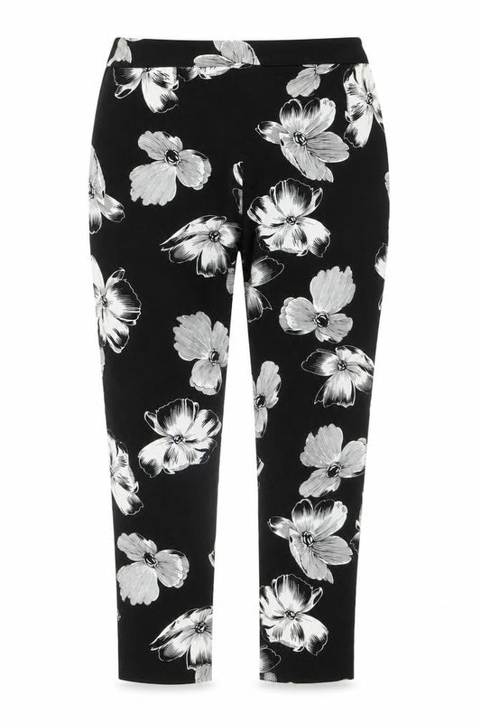 Front view of F&F women’s black floral cotton jegging jeans, size UK 32, in, 26-inch leg regular zip