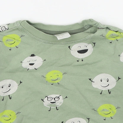 Close-up detail of H&M boys’ green geometric cotton pullover sweatshirt, size 2, years pullover