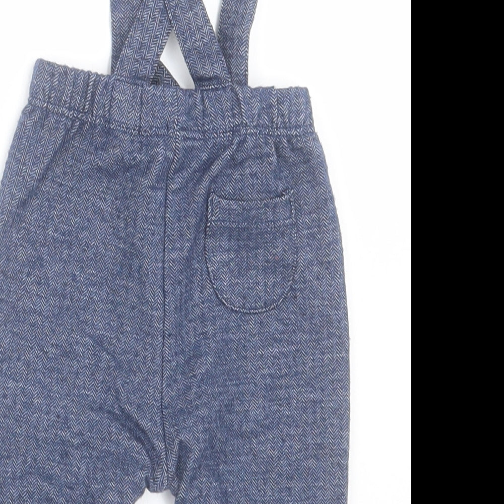 Brand and care label for George boys’ blue polyester capri trousers, size 0-3, months button - cross back