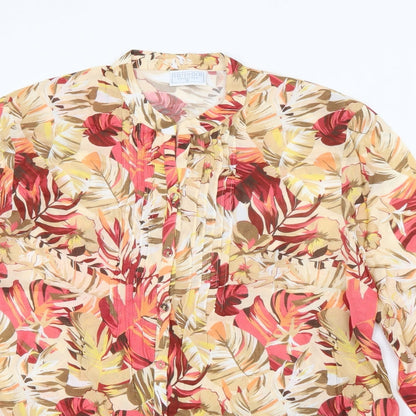 Close-up detail of cotswold collection women’s beige floral viscose basic blouse, size UK 12, crew neck