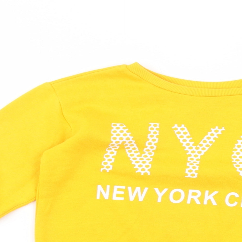 Close-up detail of Primark girls’ yellow polyester pullover sweatshirt, size 9-10, years pullover - nyc