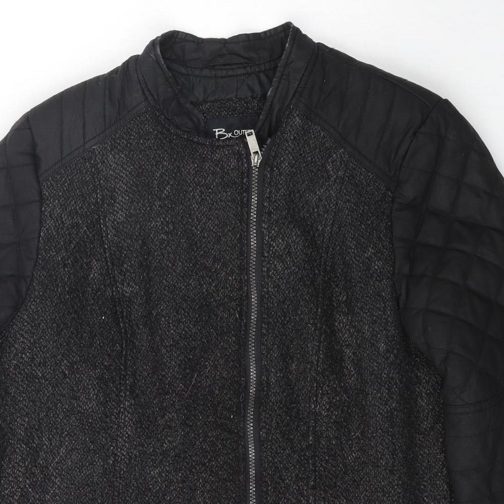 Close-up detail of Bx Outerwear women’s black jacket coat, size UK 10, zip