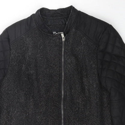 Close-up detail of Bx Outerwear women’s black jacket coat, size UK 10, zip