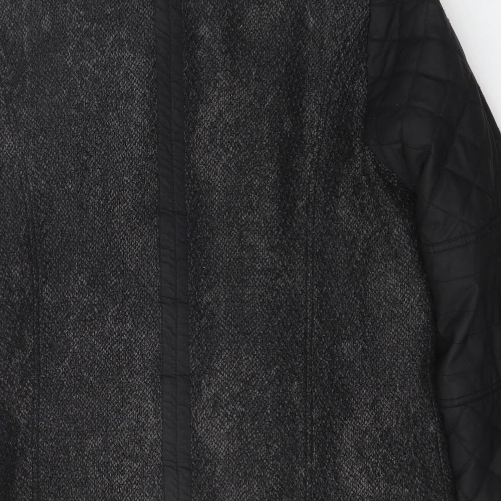 Brand and care label for Bx Outerwear women’s black jacket coat, size UK 10, zip