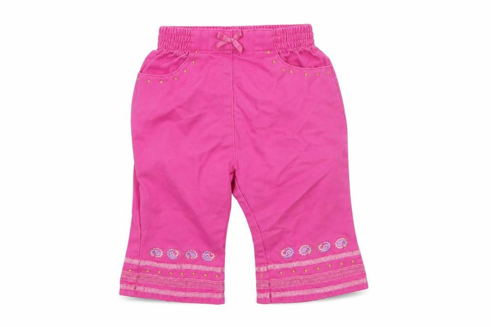 Front view of Adams girls’ pink geometric cotton cropped trousers, size 3-6, months