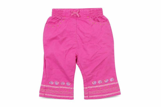 Front view of Adams girls’ pink geometric cotton cropped trousers, size 3-6, months