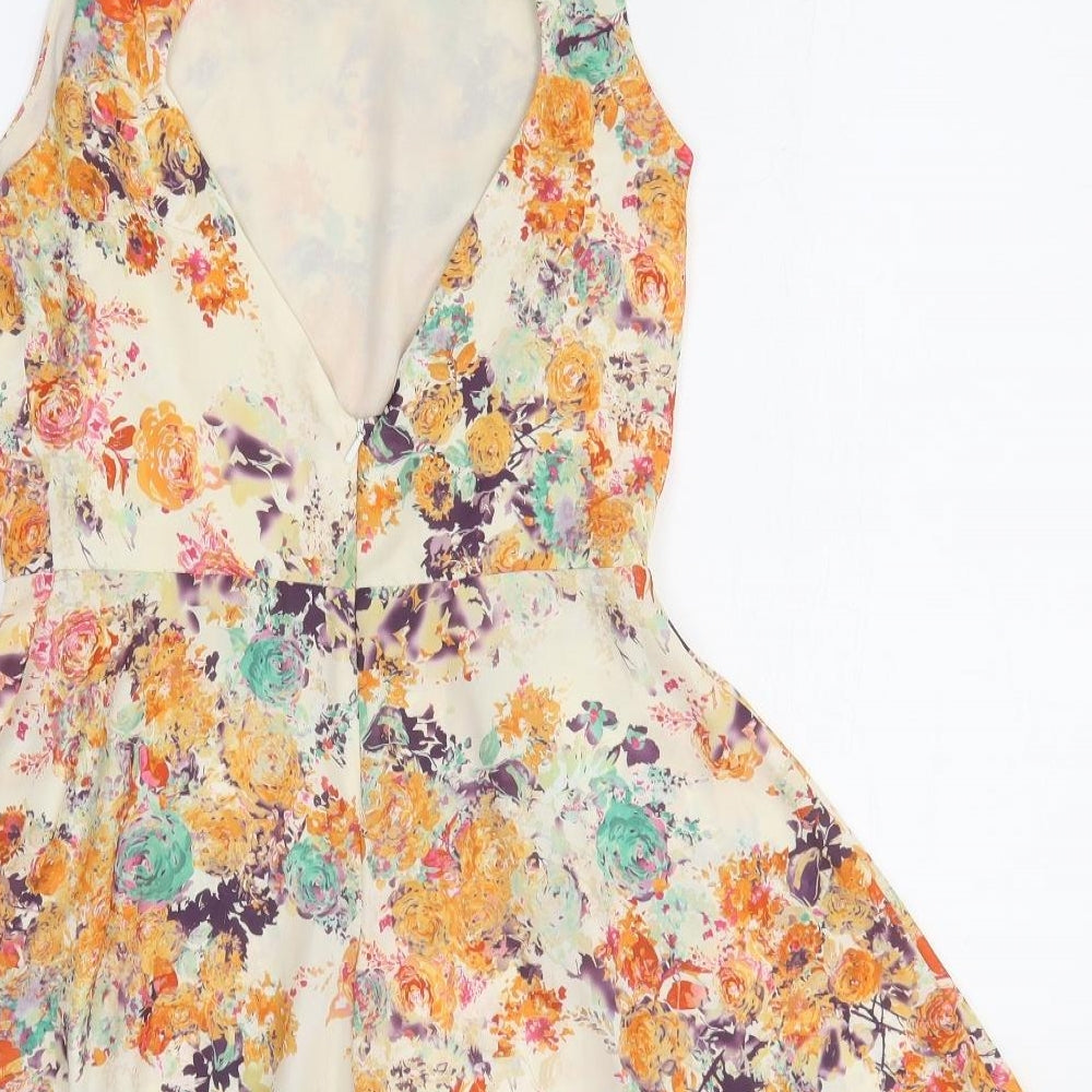 Love Womens Orange Floral Polyester Romper One-Piece Size M Pullover - Open Back