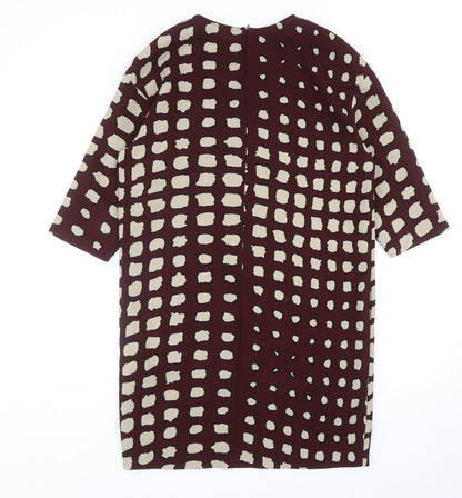 Back view of La Fee Maraboutee women’s red geometric polyester a-line, size UK 10, round neck zip