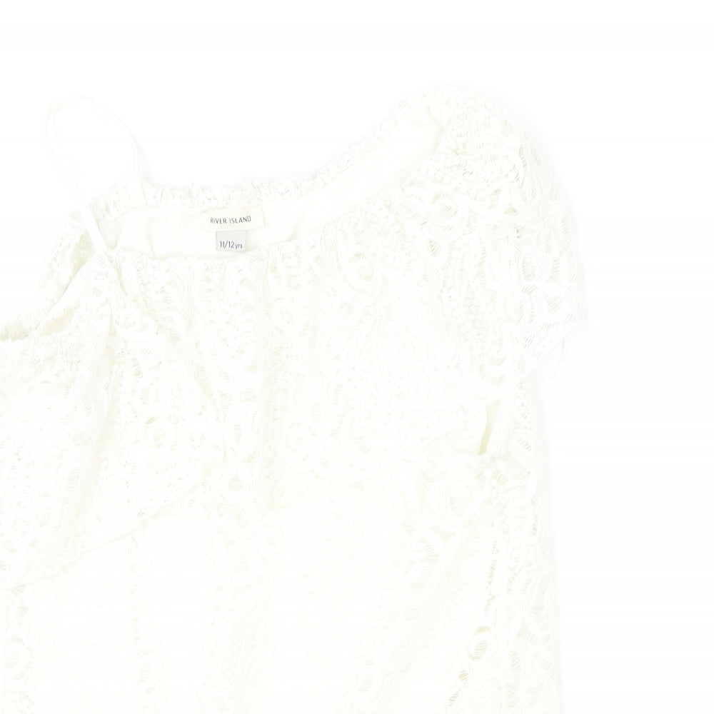 Close-up detail of River Island girls’ ivory polyester basic blouse, size 11-12, years off the shoulder pullover