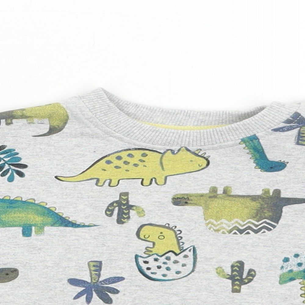 Close-up detail of Nutmeg boys’ grey cotton pullover button-up, size 0-3, months round neck snap - dinosaur, cactus