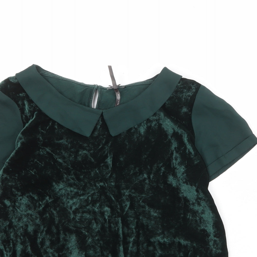 Close-up detail of Next girls’ green viscose pullover blouse, size 12, years collared button