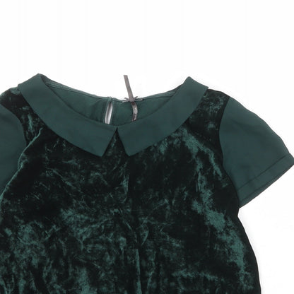 Close-up detail of Next girls’ green viscose pullover blouse, size 12, years collared button