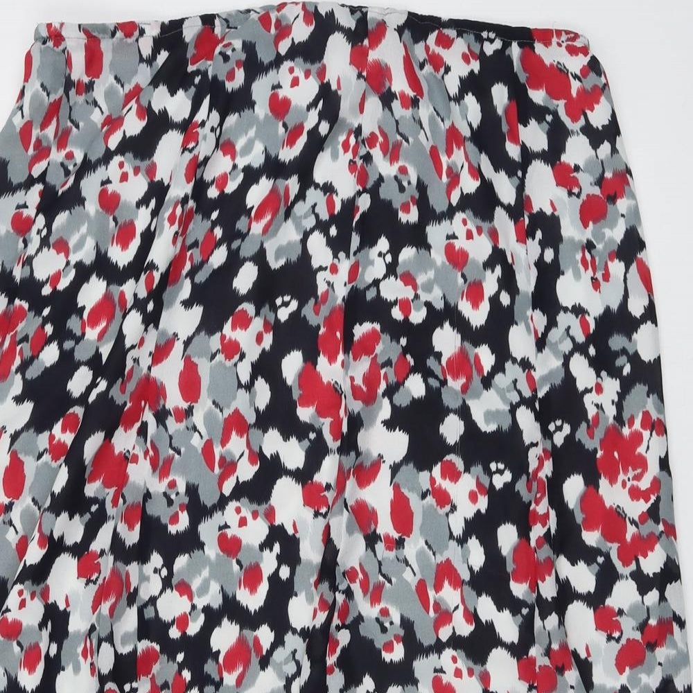 Close-up detail of Oscar B. women’s multicoloured geometric polyester swing skirt, size UK 20, zip