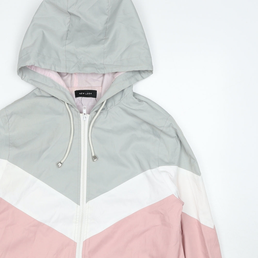 Close-up detail of New Look girls’ pink jacket, size S, zip